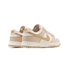 Nike Dunk Low gold swoosh